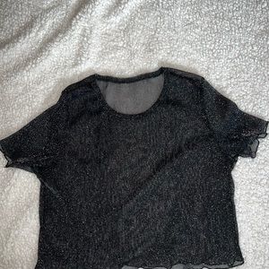 sparkly see-through top. is super cute under a tank top!! wore it for new years!
